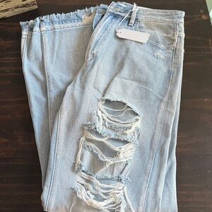 Perta 153 Light Blue Distressed Jeans, super soft and high rise. Size 11/29